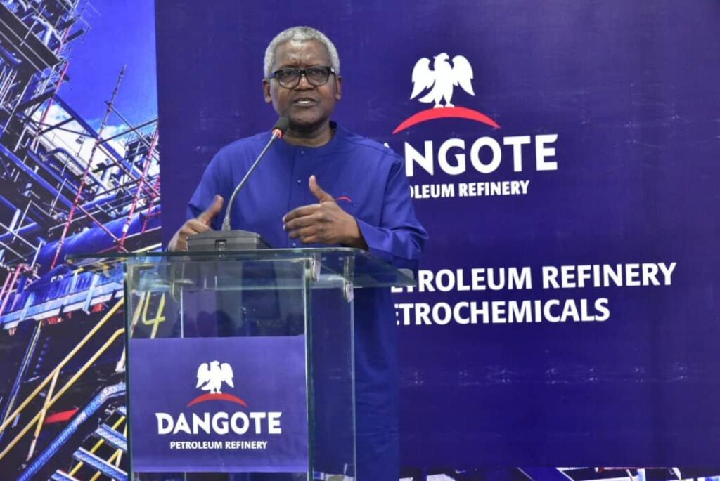 This Week, Vol. 1: Dangote's Record IPO, Kogi's Contract Wave, and the Bridge That Ended a Flood Season aliko dangote signs documents for africa’s largest ipo
